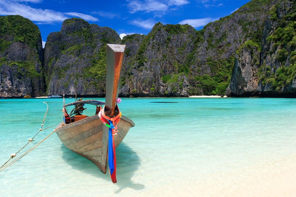 Maya Bay with long boat in Thailand